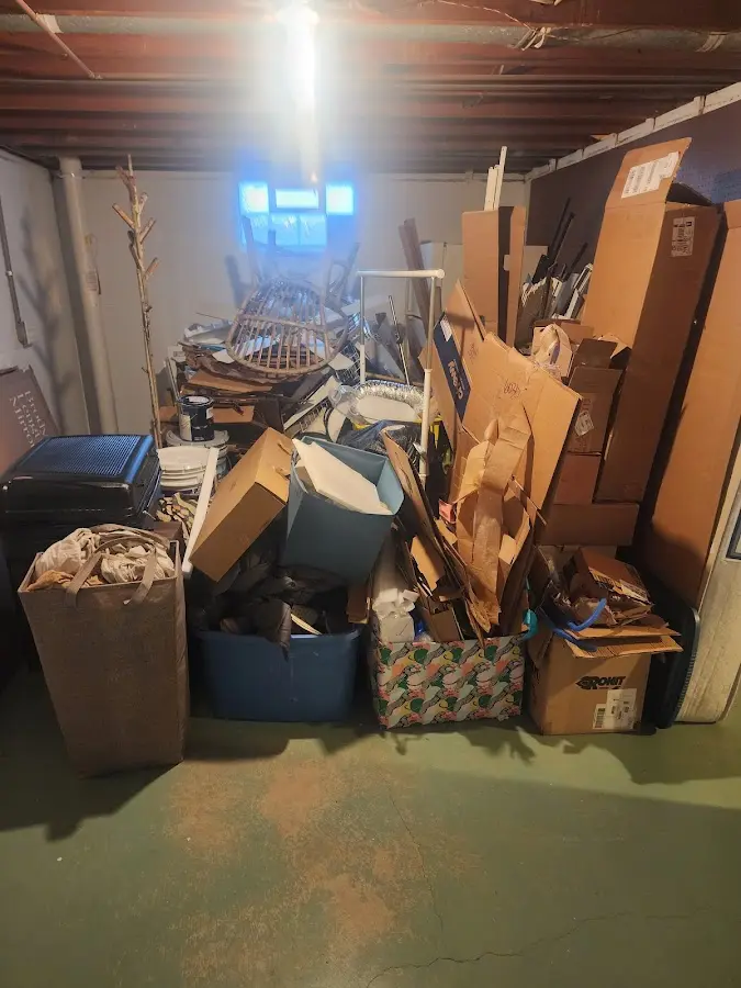 Roll-off dumpster container at job site for 15 Yard Dumpster Rental in Benton